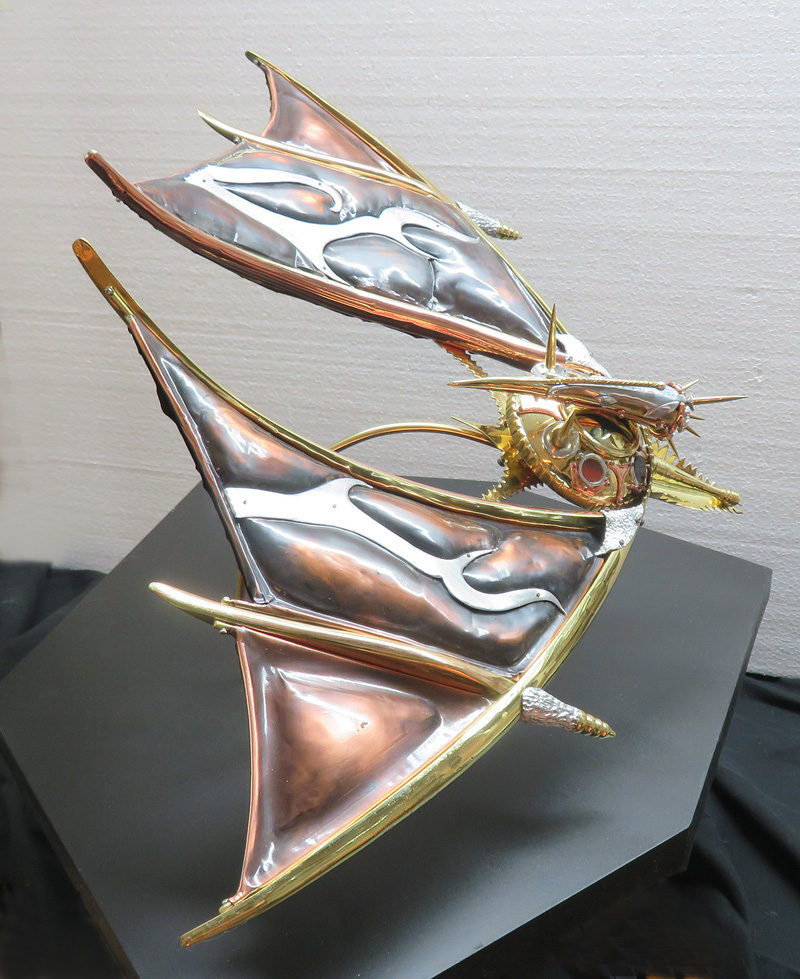 Alien Spacecraft Sculpture flying at and angle