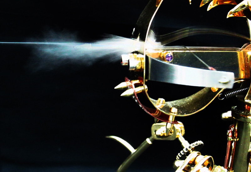 Dragon Bow Sculpture firing the bolt