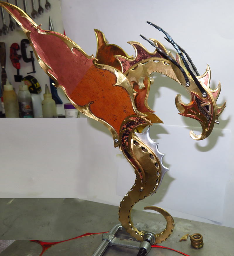 Guardian Dragon Sculpture filing scallops and work on fins